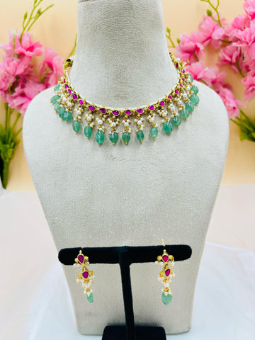 White Moti Jadau Kundan Necklace Set With Emerlad and Earnings